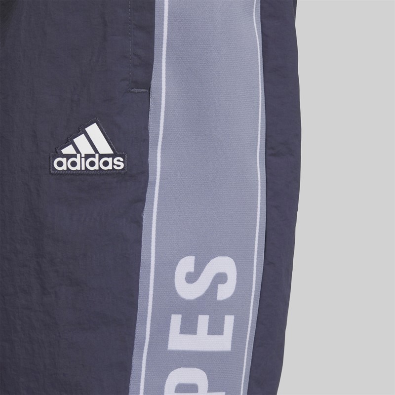 adidas Spodnie dresowe o luźnym kroju z napisem dla niego kolor Shadow Navy
