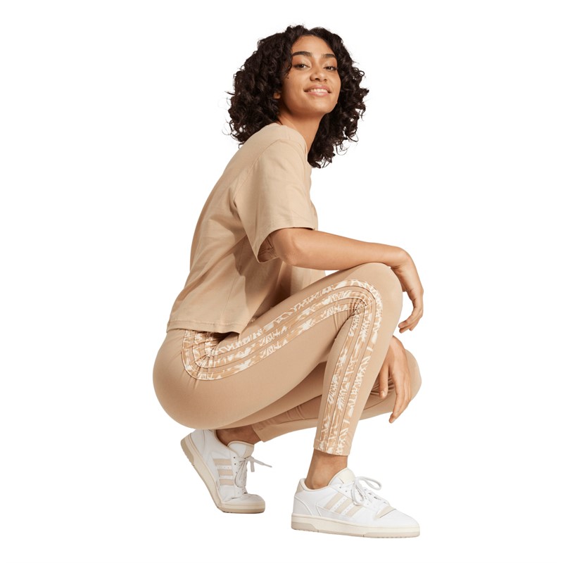 adidas Legginsy RC Essentials z sezonowym nadrukiem zwierzęcym dla niej kolor Warm Sandstone/Wonder White