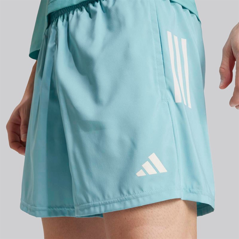 adidas Spodnie do biegania Own The Run dla niego kolor Mint Ton