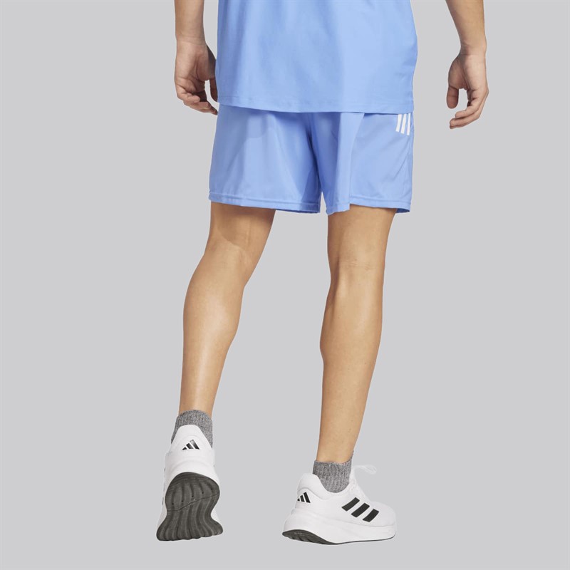 adidas Spodnie do biegania Own The Run dla niego kolor Blue Fushion