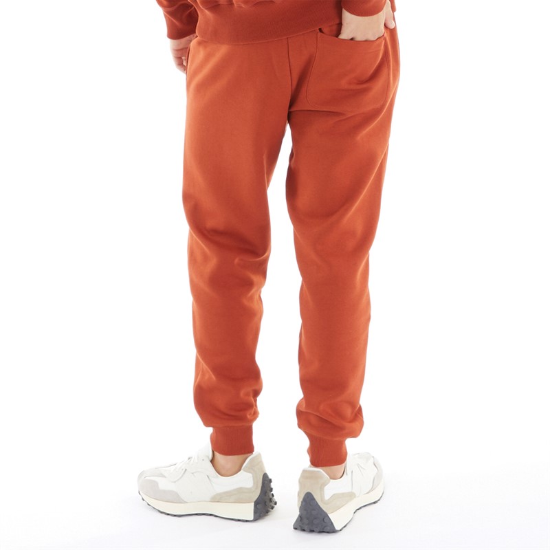 New Balance Heren Fleece Sweatpants met klein logo Baksteenrood