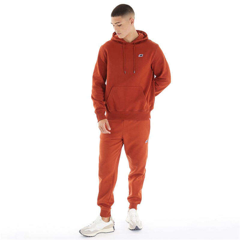 New Balance Heren Fleece Sweatpants met klein logo Baksteenrood