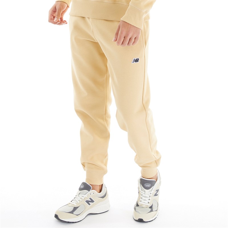 New Balance Pantalon de Survêtement en molleton Homme avec petit logo doré