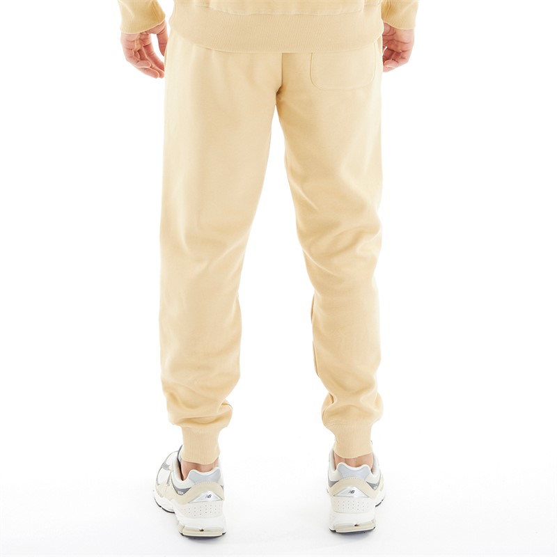 New Balance Pantalon de Survêtement en molleton Homme avec petit logo doré