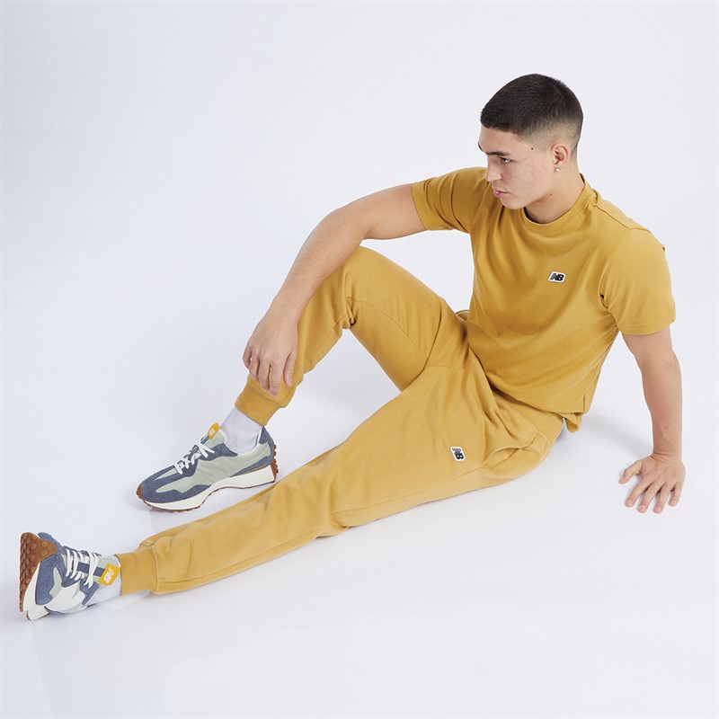 New Balance Mens NB Small Logo Pants Golden Hour