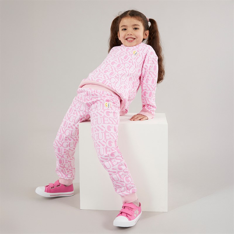 Guess joggersy dla dziewczynki kolor z logo Fuchsia