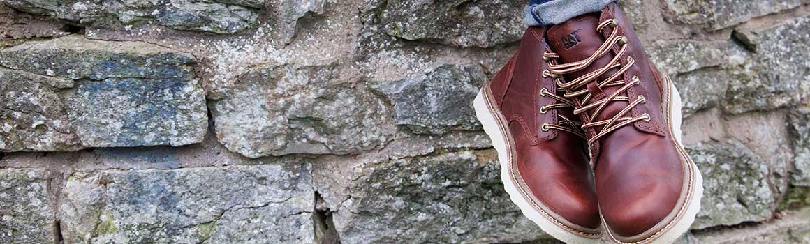 Worn men’s Caterpillar boots