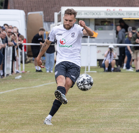 Hereford Player in 25-26 home kit.