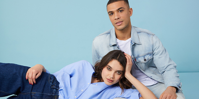 Well dressed couple in spring ready fashion.